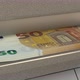 50 euro in cash dispenser. Withdrawal of cash from an ATM. - VideoHive Item for Sale