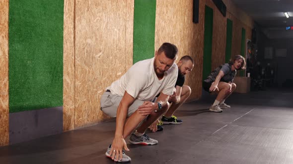 Young Man Workout Before Fitness Training Session at the Gym