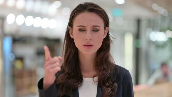 Portrait of Angry Young Businesswoman Arguing Fighting