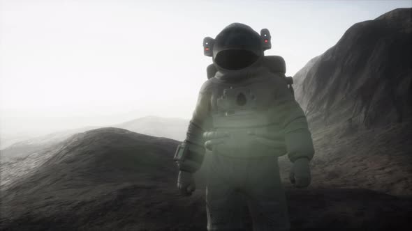 Astronaut on Another Planet with Dust and Fog alt