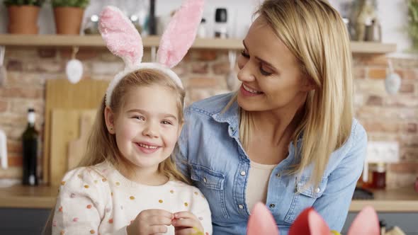 Video portrait of mother and little daughter during Easter. Shot with RED helium camera in 8K.