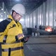 Portrait of Professional Heavy Industry Engineer / Worker Wearing Safety Uniform,  - VideoHive Item for Sale