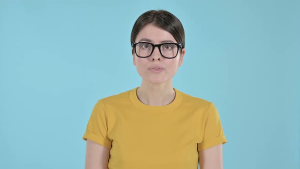 Young Woman Feeling Shocked and Annoyed on Purple Background 