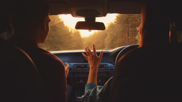 Two Happy Friends Enjoy Talk Travel in Car