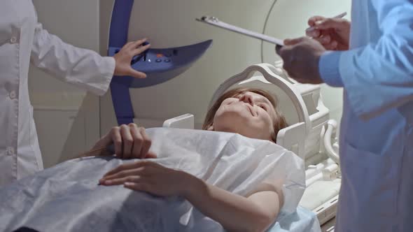 Young Woman Preparing for MRI Scan