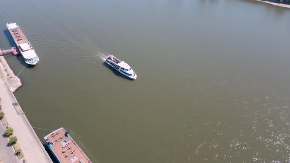 Cologne, Germany - Following a passenger ship for tourists traveling on the river of Rhine in Köln o