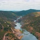 Aerial View of the Mountain River Near Mertola - VideoHive Item for Sale