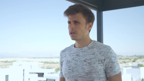 Man running with a treadmill on a rooftop