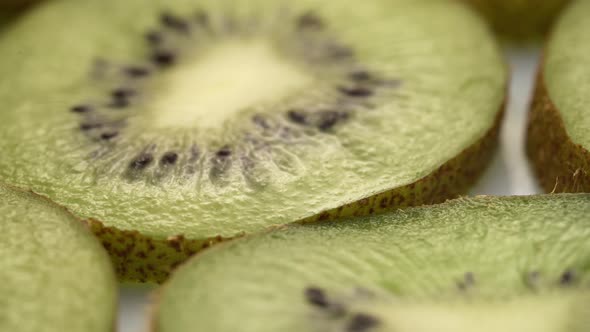 Kiwi Slices Closeup, Macro Food Summer Background, Fruits Top View. Rotate