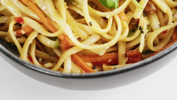 Asian Rice Noodles with Fried Meat and Spicy Vegetables Top View