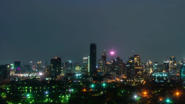 Time lapse night cityscape and high-rise buildings in metropolis city center