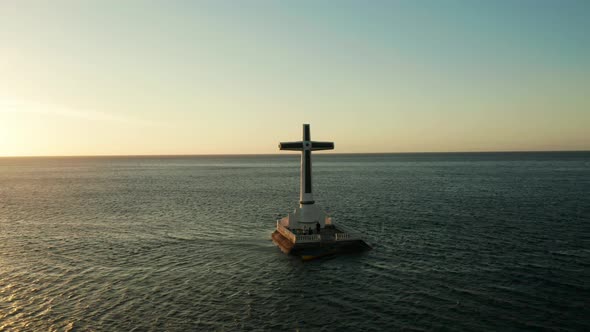 Sunken Cemetery Cross in Camiguin Island, Philippines.