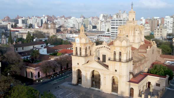 Roman Catholic Cathedral of Cordoba showered in sunlight, drone dolly in