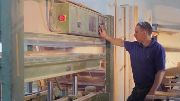 Carpenter working with a machine