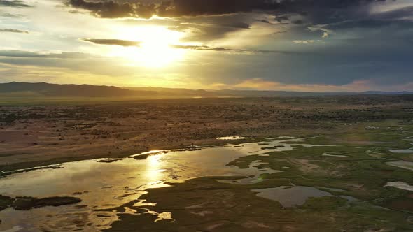 Sand Dunes Bayan Gobi and Lake at Sunset