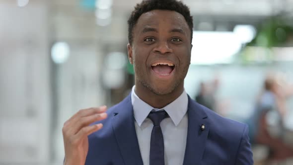 Portrait of African Businessman Talking on Online Video Call