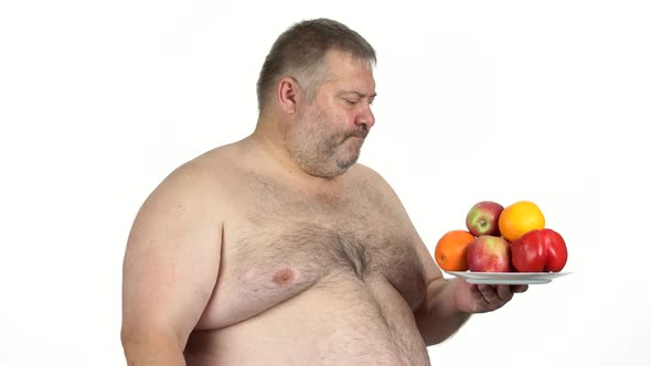 Fat Man with Healthy Food on White Background