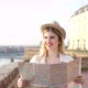 Beautiful Woman Traveling and Sightseeingwith Map in Hand - VideoHive Item for Sale