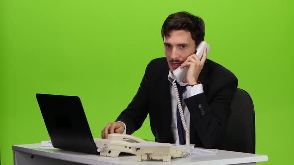 Boss Man Irritated Respond To Several Phone Calls. Green Screen