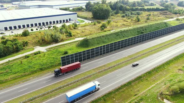 Aerial view of goods warehouse. Logistics center in industrial city zone from above. Aerial view of