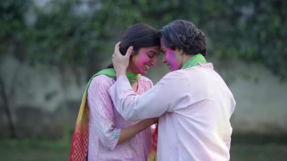 Beautiful Indian couple doing romance at Holi party