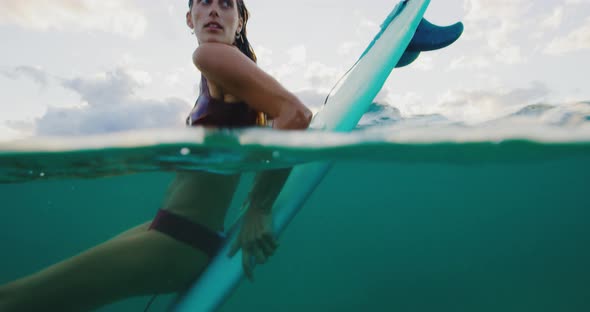 Young Woman Surfing