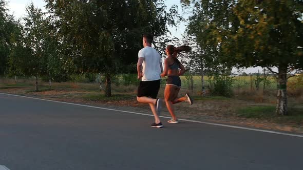 Run, A Young Couple, Side View, Slow Motion