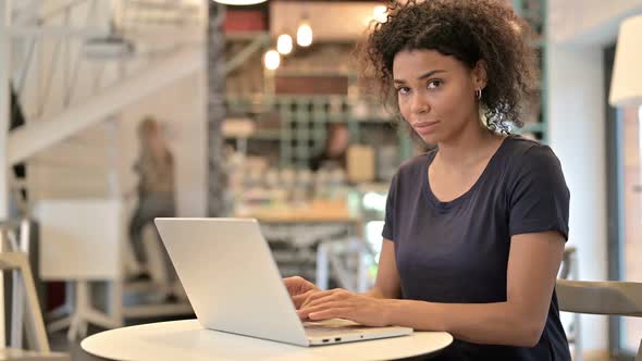 No Finger Gesture Young African Woman with Laptop