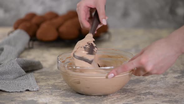 Mixing Chocolate Cream in Glass Bowl..