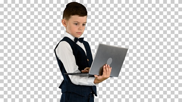 Concentrated boy in a bow tie and waistcoat, Alpha Channel