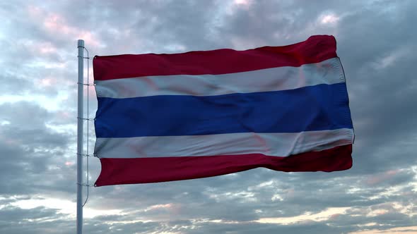 Realistic Flag of Thailand Waving in the Wind Against Deep Dramatic Sky.  UHD 60 FPS Slow-Motion