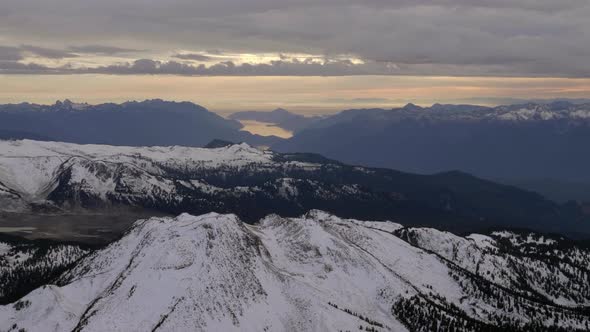 Scenery Of Snowscape Ridge Under Overcast Sky During Foggy Day At Vancouver, Pemberton, Whistler And