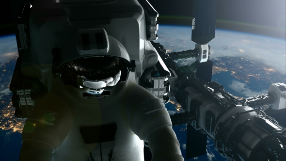 International Space Station and Astronaut Orbiting Earth alt