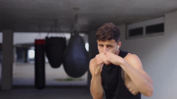 Martial Art Fighter Does Shadow Boxing to the Camera