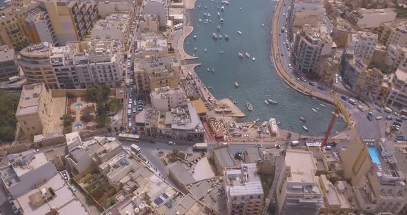 Spinola Bay with Traditional maltese Luzzu