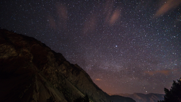 of Stars Moving Above a Mountain