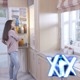 Young Woman With Apple In Hand In Front Of Fridge - VideoHive Item for Sale