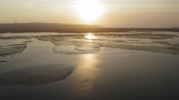 Aerial Drone Flight Over Panorama at Sunset at the Bay Bali Indonesia