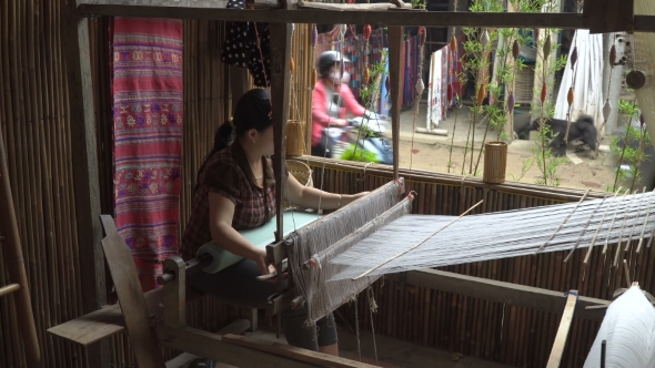 Woman Working with a Waist Loom