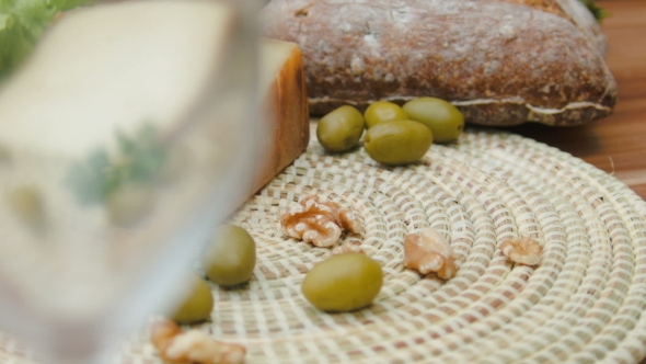 Still Life of Bread, Olives and Nuts, Tomme Cheese