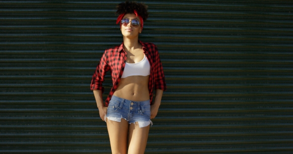 Sexy African American Young Woman Leaning on Wall