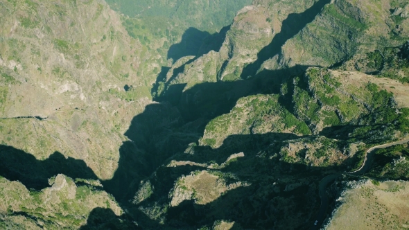 Aerial View of the Canyon and Mountains Near House