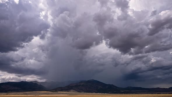 Time lapse of rainstorm moving over the mountains in Utah