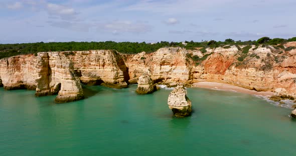 Drone footage from Praia da Marinha, one of the most famous locations on the Algarve coast