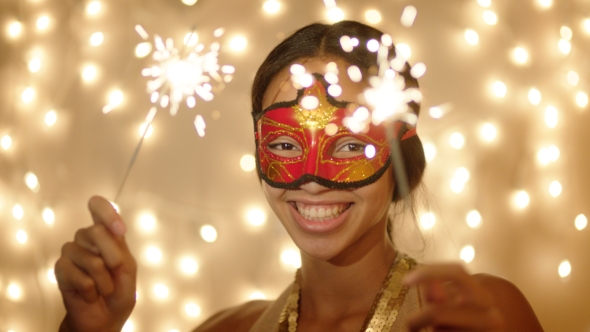 Beautiful Young Woman Wearing Carnival Mask