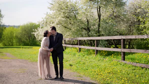 Romantic Date of Loving Couple in Nature Happy Man and Woman are Walking on Path