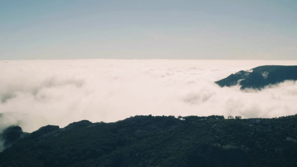 Aerial View of the Canyon and Mountains with Clouds