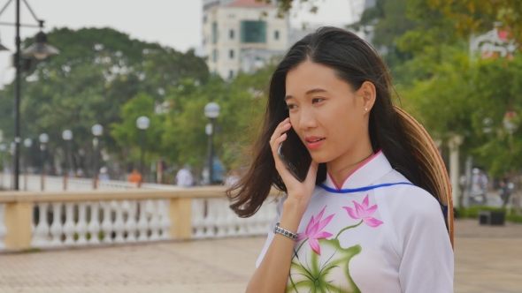 Vietnamese Girl Talking on the Phone