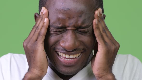 Young African Man Having Headache