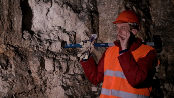 Worker Smoking a Cigarette When Resting